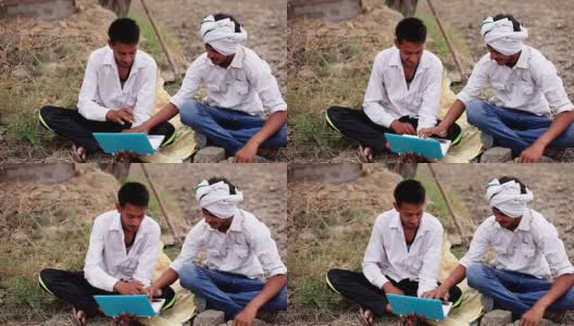 村民使用笔记本电脑高清在线视频素材下载