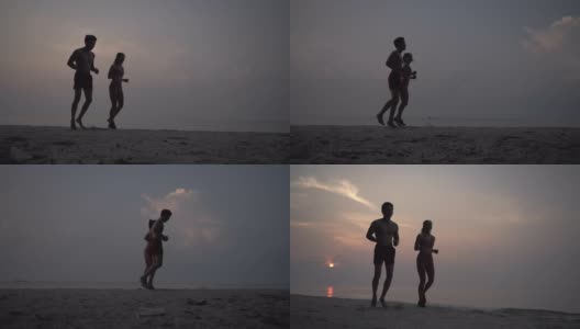 一对亚洲情侣在沙滩上慢跑。高清在线视频素材下载