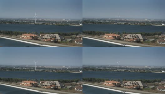 棕榈谷湖和加州渡槽旁的风力涡轮机高清在线视频素材下载