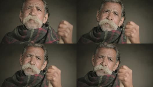 大胡子老人的画像，拿着竹竿。高清在线视频素材下载