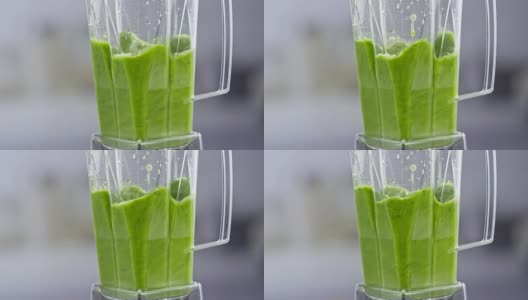 绿色奶昔在搅拌机中旋转高清在线视频素材下载