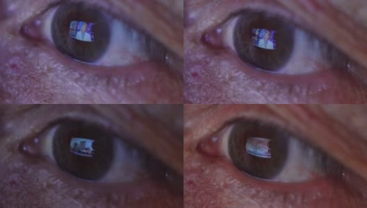 老人的眼睛反射着电视屏幕高清在线视频素材下载