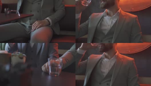 西装革履的男人在咖啡馆喝着一杯水高清在线视频素材下载
