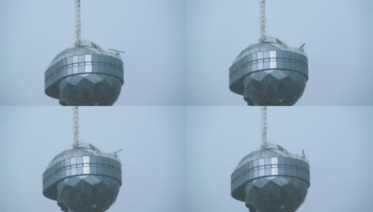 海港交通管制塔的近视图在一个雨天的天空背景高清在线视频素材下载