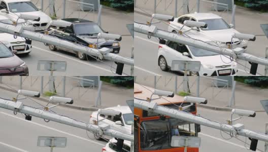 三个交通安全摄像头的特写，监控在路上的闭路电视高清在线视频素材下载