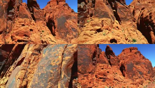 鸟瞰图上的红色岩石山在沙漠景观与明亮的蓝色天空高清在线视频素材下载