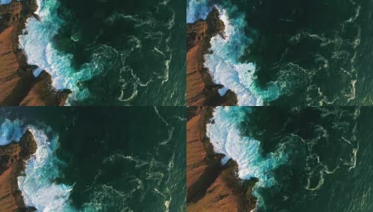 史诗海洋海岸鸟瞰图与海浪打破和泡沫高清在线视频素材下载
