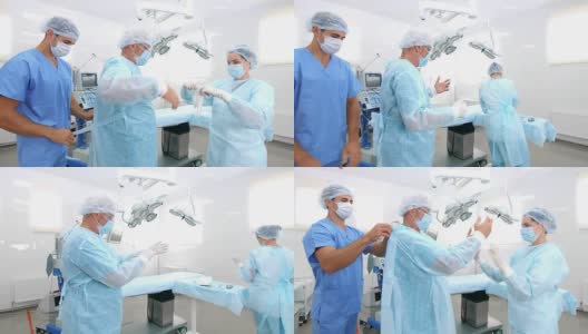 护士和助理在手术室给手术服敷料高清在线视频素材下载