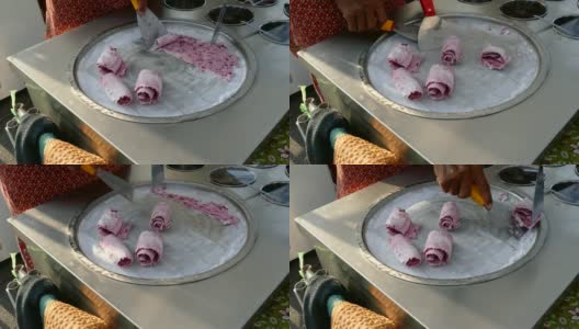 厨师们正在用平底锅制作冰淇淋，平底锅上有冰块高清在线视频素材下载