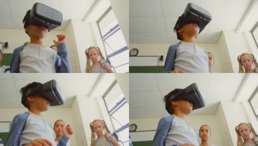学生使用虚拟现实耳机在教室在学校4k高清在线视频素材下载