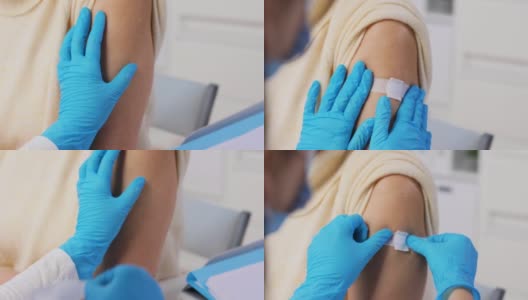护士给接种疫苗的妇女贴医用贴片高清在线视频素材下载