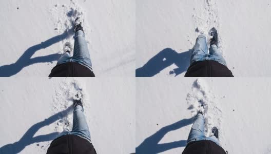 穿雪鞋的男人在刚刚落下的雪上高清在线视频素材下载