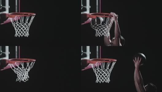 一个篮球运动员把球灌入篮筐的SLO动作高清在线视频素材下载