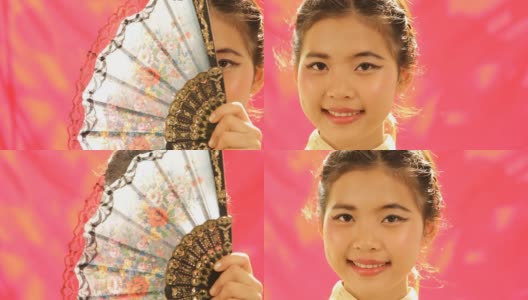 中国女孩和她的扇子高清在线视频素材下载