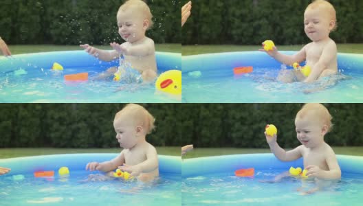 婴儿在小池子里溅水高清在线视频素材下载