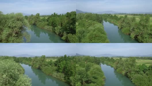 从空中飞过乡间的一条河高清在线视频素材下载