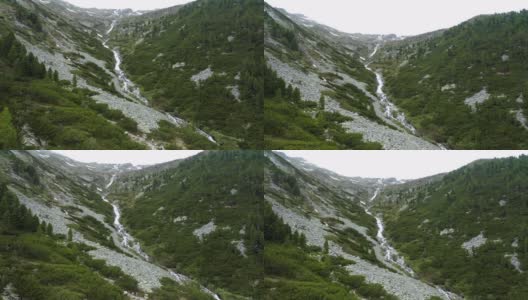 奥地利Tirol Olpererhutte Zillertal附近的山景鸟瞰图和春季瀑布高清在线视频素材下载