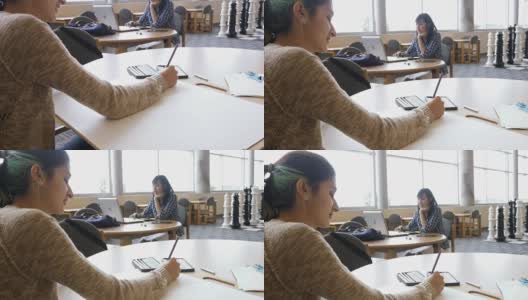 美丽的西班牙裔少女在STEM学校的工程类草图设计高清在线视频素材下载