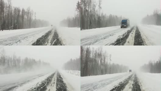 汽车行驶在积雪覆盖的公路上。高清在线视频素材下载