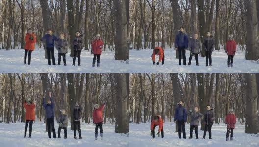五个男孩站在冬天的公园里，用慢镜头把雪抛起来高清在线视频素材下载