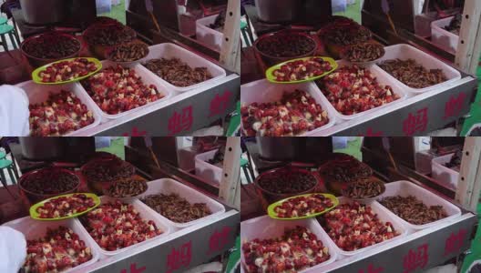 卖肉、虾、昆虫的摊位在中国亚洲高清在线视频素材下载