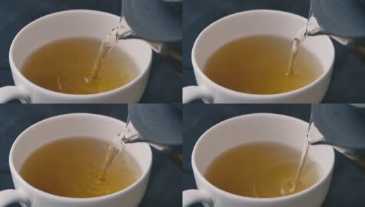 SLO MO镜头红茶倒入杯中精致的晚餐下午茶高清在线视频素材下载