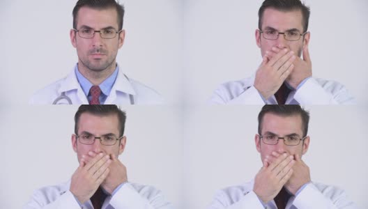 年轻英俊的西班牙裔医生戴着眼镜高清在线视频素材下载