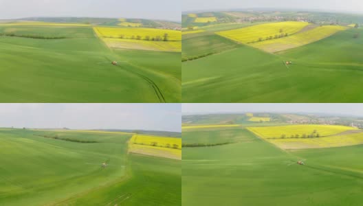 一名空中的农民在一片被风力涡轮机包围的土地上喷洒杀虫剂高清在线视频素材下载