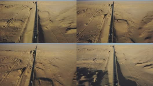 汽车在戈壁沙漠上行驶的实时/鸟瞰图高清在线视频素材下载