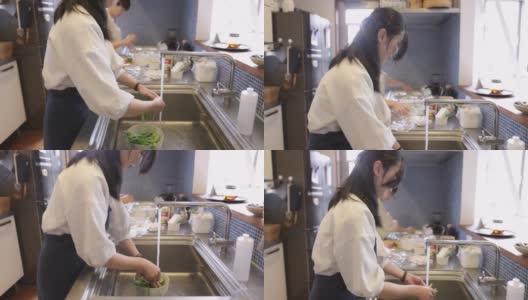女性朋友在家做饭，洗菜高清在线视频素材下载
