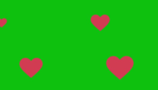 粉红色的心在绿色背景推进到右边和留下左边空白高清在线视频素材下载