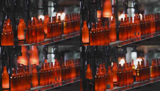 在工业工厂的自动输送流水线上生产玻璃瓶高清在线视频素材下载