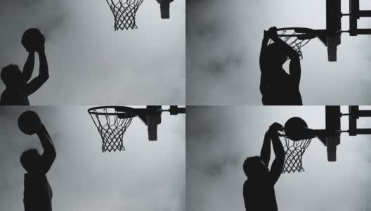 SLO MO剪影篮球运动员扣篮高清在线视频素材下载