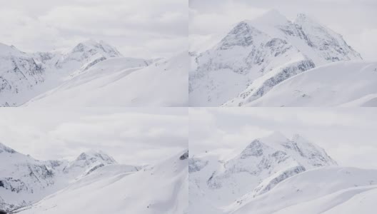 在一个有雾的冬日，雪山的景色高清在线视频素材下载