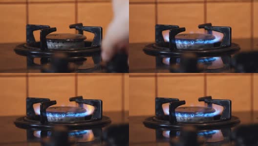 手打开火燃气从厨房煤气炉燃烧高清在线视频素材下载