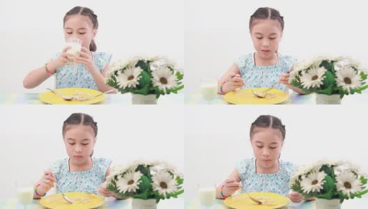 Girl eating fried rice.高清在线视频素材下载
