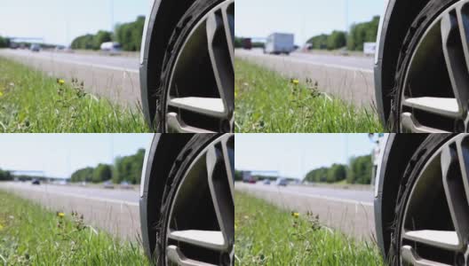 在英国伦敦的M25高速公路上，一辆汽车在高速公路上爆胎后，车胎上出现了一个大裂缝高清在线视频素材下载