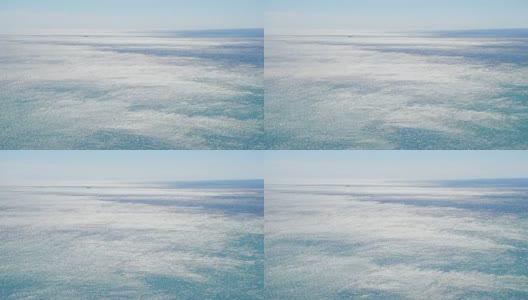 空中视频:晨曦中的蓝色海面高清在线视频素材下载