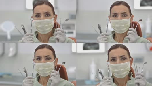 HD多莉:牙医展示她的工具高清在线视频素材下载