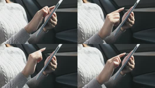 近距离观察亚洲女性在车里使用平板智能手机高清在线视频素材下载