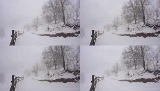 山腰上起了雾，覆盖了游客们快速穿行的硬木路边高清在线视频素材下载