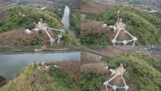 泰国罗依市，从无人机鸟瞰湄公河上的大佛雕像和空中步道高清在线视频素材下载