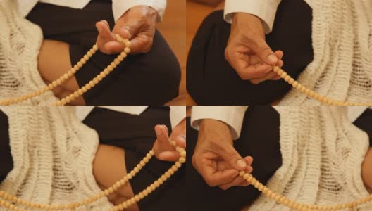 亚洲老妇人在礼拜场所祈祷和冥想高清在线视频素材下载