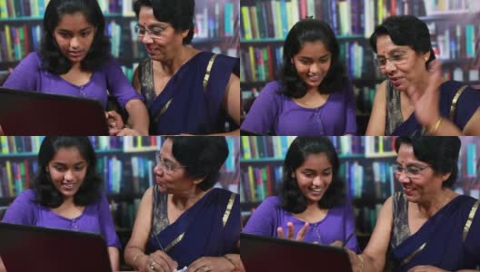 Cheerful Indian Senior Woman with her Grandaughter Using Laptop高清在线视频素材下载
