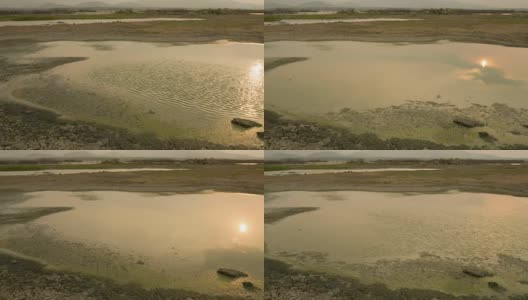 时间推移:旱季干湖附近的龟裂土地高清在线视频素材下载