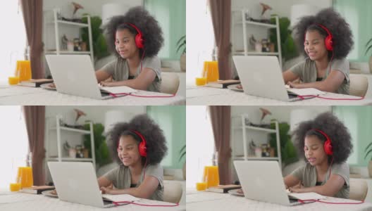 4K非洲小女孩与老师在笔记本电脑上在线学习高清在线视频素材下载