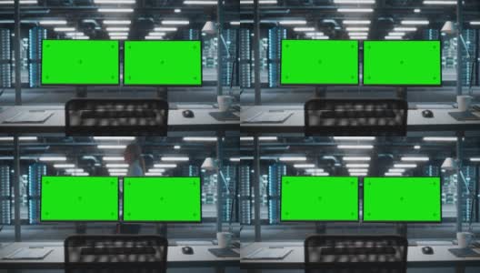 高技术数据中心服务器，两个绿色屏幕的色度键显示在个人电脑上，站在桌子上。现代监控网络服务概念、云计算、网络安全高清在线视频素材下载