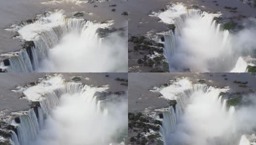 鸟瞰图中的伊瓜苏瀑布是世界上最大的瀑布系统，位于阿根廷和巴西的边界高清在线视频素材下载