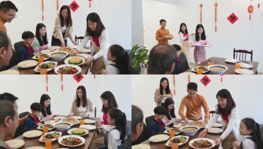 三代亚洲华人家庭在家里一起吃团圆饭高清在线视频素材下载