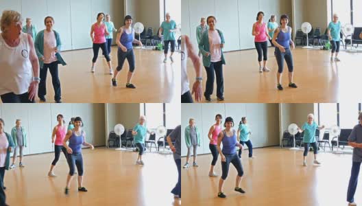 不同年龄段的女性在健身课上做有氧舞蹈高清在线视频素材下载